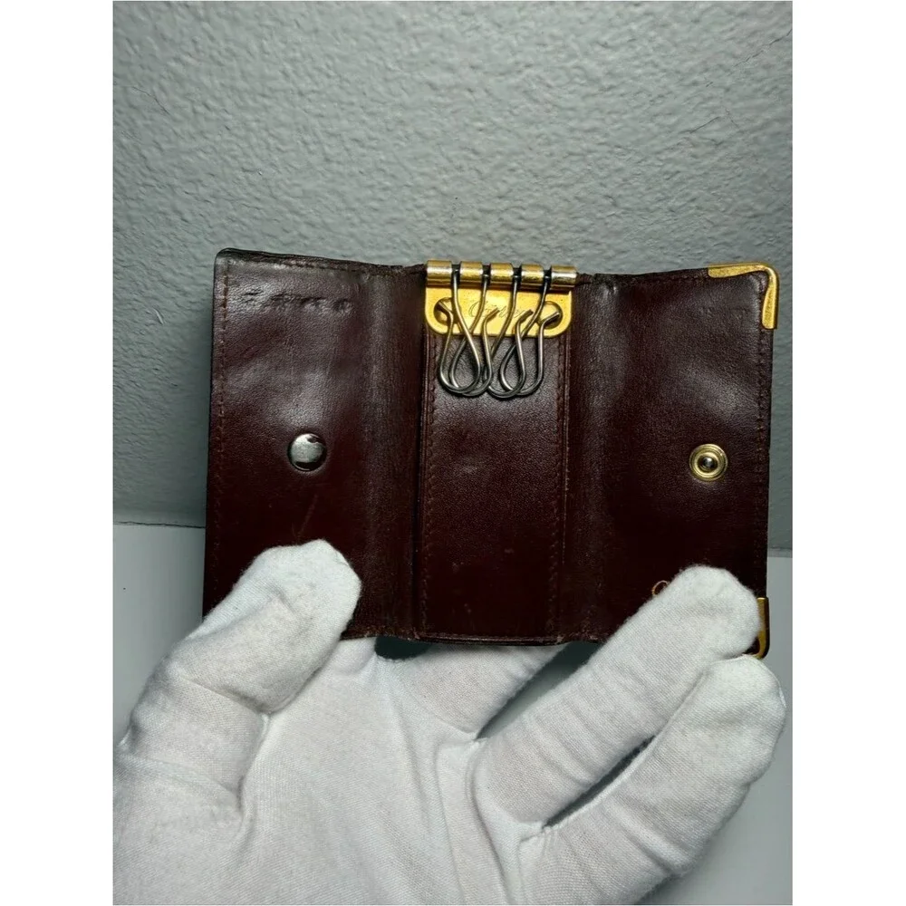 Cartier Brownish Red Leather Card Holder with Gold Corner Accents